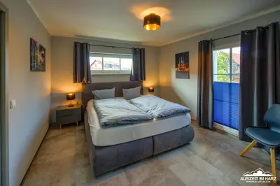 Ein Bett oder Betten in einem Zimmer der Unterkunft Auszeit-im-Harz Haus 6 Ferienhaus