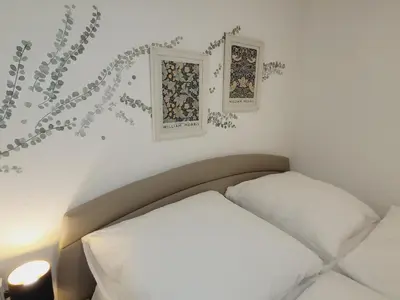 Ein Bett oder Betten in einem Zimmer der Unterkunft FeWo Glockenberg im Ferienpark Altenau