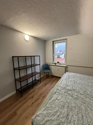 Ein Bett oder Betten in einem Zimmer der Unterkunft NEU! Canossablick Bad Harzburg Inklusive Bettwäsche