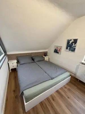 Ein Bett oder Betten in einem Zimmer der Unterkunft NEU! Canossablick Bad Harzburg Inklusive Bettwäsche