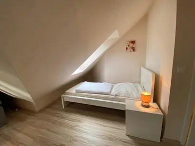 Ein Bett oder Betten in einem Zimmer der Unterkunft Hahnenklee Meine Perle