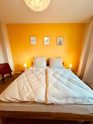 Ein Bett oder Betten in einem Zimmer der Unterkunft Ferienwohnung Kaiserliebe