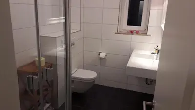 Ein Badezimmer in der Unterkunft FeWo am Wurmberg Braunlage I Verwaltung und Betreuung durch FIRMA ZZ-Braunlage