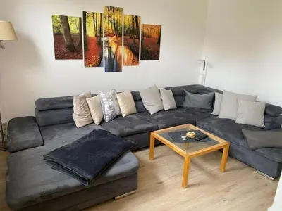 Ein Sitzbereich in der Unterkunft Holiday apartment on the Anger