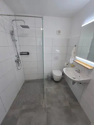 Ein Badezimmer in der Unterkunft FeWo 101