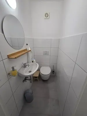 Ein Badezimmer in der Unterkunft FeWo 101