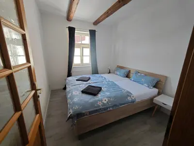 Ein Bett oder Betten in einem Zimmer der Unterkunft FeWo 101