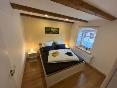 Ein Bett oder Betten in einem Zimmer der Unterkunft Ferienwohnung Knopp
