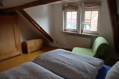 Ein Bett oder Betten in einem Zimmer der Unterkunft Ferienhaus Anno 1720