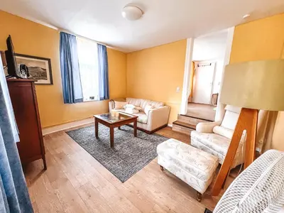 Ein Sitzbereich in der Unterkunft Gemütliche Terassenwohnung mit rustikalem Charme
