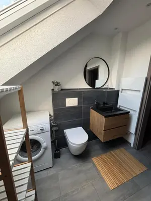 Ein Badezimmer in der Unterkunft International 7