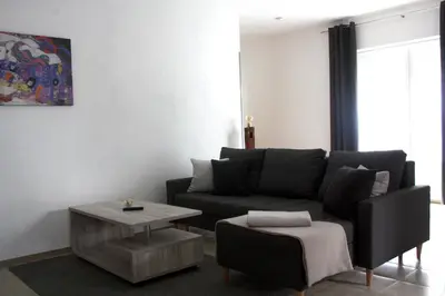 Ein Sitzbereich in der Unterkunft Ferienwohnung Gundermann