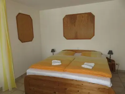 Ein Bett oder Betten in einem Zimmer der Unterkunft Prachtig uitzicht