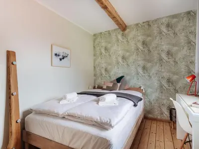 Ein Bett oder Betten in einem Zimmer der Unterkunft Fingerhut Modern Retreat
