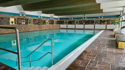 Der Swimmingpool an oder in der Nähe von Bergzauber Apartment mit Pool, Sauna, Balkon und Panoramablick