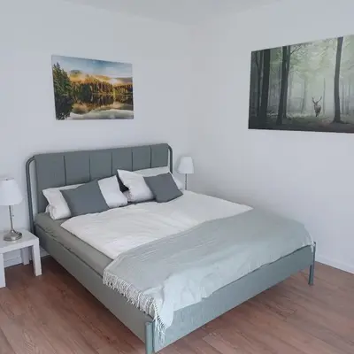 Ein Bett oder Betten in einem Zimmer der Unterkunft Wandertraum