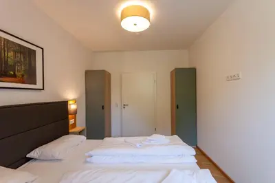 Ein Bett oder Betten in einem Zimmer der Unterkunft Fewo WurmbergLaune - nur 350 m zur Wurmbergseilbahn