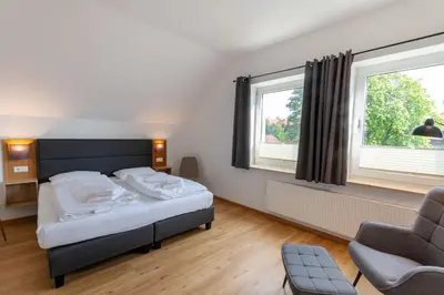 Ein Bett oder Betten in einem Zimmer der Unterkunft Fewo WurmbergLaune - nur 350 m zur Wurmbergseilbahn