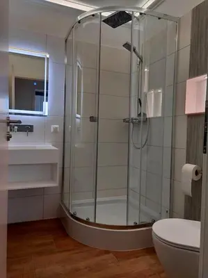 Ein Badezimmer in der Unterkunft Ferienwohnung Sagenstube im Panoramic Hohegeiß 16 Etage Fahrstuhl Hoch hinaus im Harz