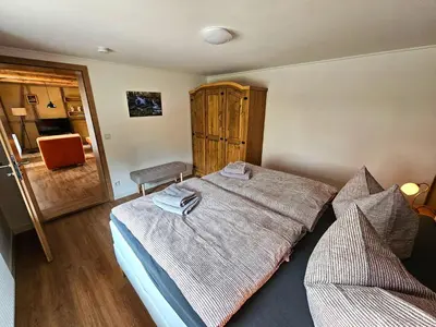 Ein Bett oder Betten in einem Zimmer der Unterkunft Kleine Bergstraße 2 - Haus 2