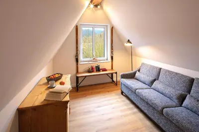 Ein Sitzbereich in der Unterkunft Plumbohms Haus Looges