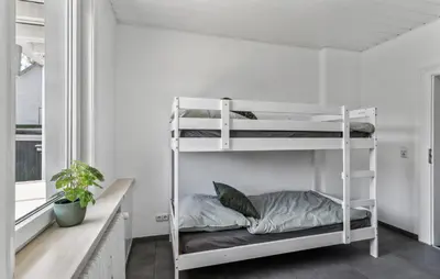 Ein Bett oder Betten in einem Zimmer der Unterkunft Mimis Bike & Hike