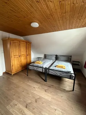 Ein Bett oder Betten in einem Zimmer der Unterkunft Apartment Waldkauz - Altenau