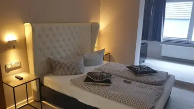 Ein Bett oder Betten in einem Zimmer der Unterkunft VALHALLA'S Hütte