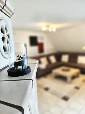 Ein Sitzbereich in der Unterkunft Design Apartment Grünwald große Wohnung auf 2 Etagen