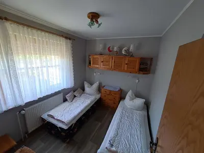 Ein Bett oder Betten in einem Zimmer der Unterkunft Oleander