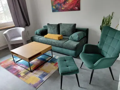 Ein Sitzbereich in der Unterkunft Haus PANORAMA - Appartement Auszeit 2