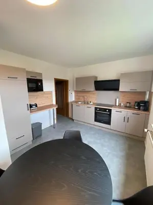 Küche/Küchenzeile in der Unterkunft Haus PANORAMA - Appartement Auszeit 1