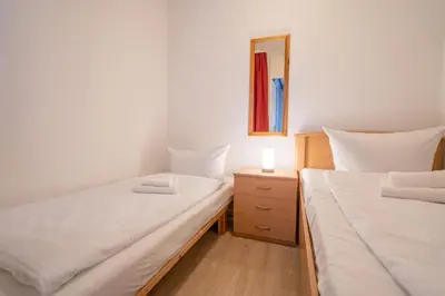 Ein Bett oder Betten in einem Zimmer der Unterkunft Phlox