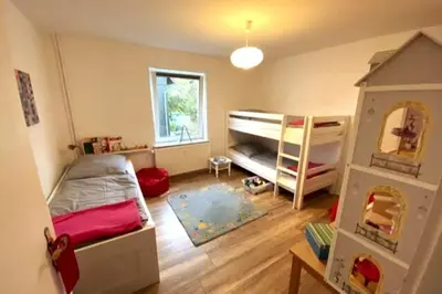 Ein Bett oder Betten in einem Zimmer der Unterkunft Haus PANORAMA - Appartement Auszeit 6