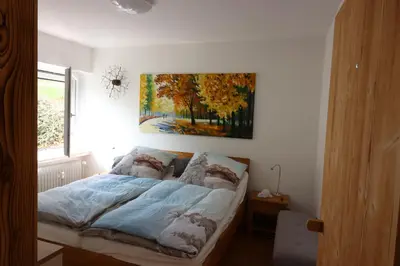 Ein Bett oder Betten in einem Zimmer der Unterkunft FeWo Happy Harz