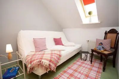 Ein Bett oder Betten in einem Zimmer der Unterkunft Ferienwohnung Anemone mit Bergblick