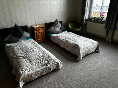 Ein Bett oder Betten in einem Zimmer der Unterkunft Fewo an der Stadtmauer