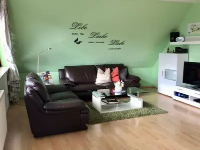 Ein Sitzbereich in der Unterkunft Ferienwohnung Waldfried