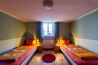 Ein Bett oder Betten in einem Zimmer der Unterkunft 