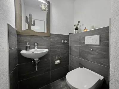 Ein Badezimmer in der Unterkunft Familienwohnung Grünwald