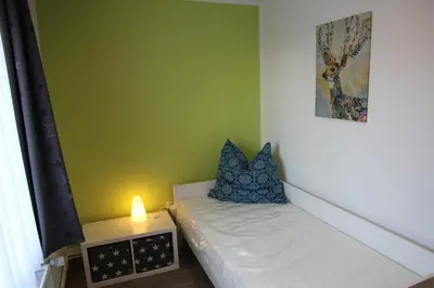 Ein Bett oder Betten in einem Zimmer der Unterkunft Wohnung Julius 8