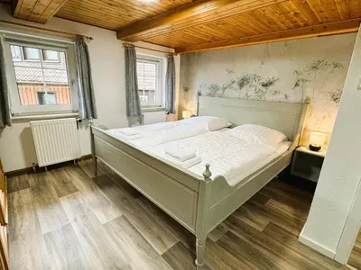 Ein Bett oder Betten in einem Zimmer der Unterkunft FeWo Dana im Haus HarzGlück