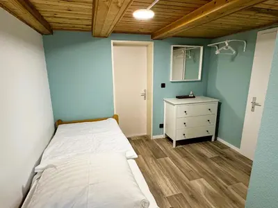 Ein Bett oder Betten in einem Zimmer der Unterkunft FeWo Dana im Haus HarzGlück