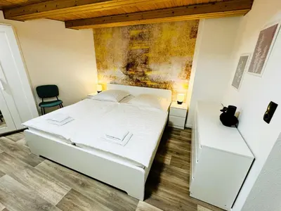Ein Bett oder Betten in einem Zimmer der Unterkunft FeWo Lucas im Haus HarzGlück