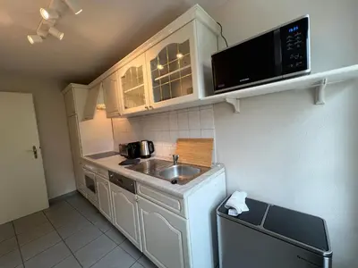 Küche/Küchenzeile in der Unterkunft gina stay - Apartmenthaus im Zentrum von Quedlinburg