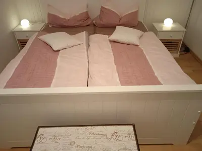 Ein Bett oder Betten in einem Zimmer der Unterkunft Ferienwohnung Merlina WLAN-Wandern-Radfahren-Motoradurlaub