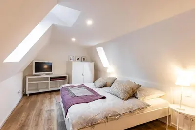 Ein Bett oder Betten in einem Zimmer der Unterkunft Ferienwohnung Zuckerschnute