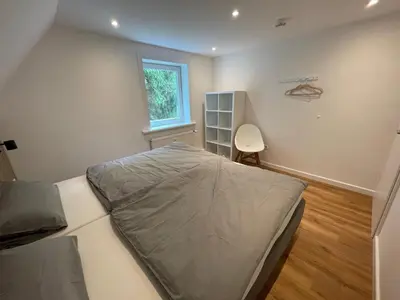 Ein Bett oder Betten in einem Zimmer der Unterkunft Harz Escape