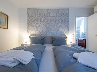 Ein Bett oder Betten in einem Zimmer der Unterkunft Hexenglück Hahnenklee
