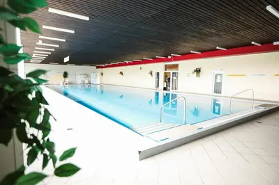 Der Swimmingpool an oder in der Nähe von Harzträume Panorama Lodge, im Harz, mit Schwimmbad und Sauna